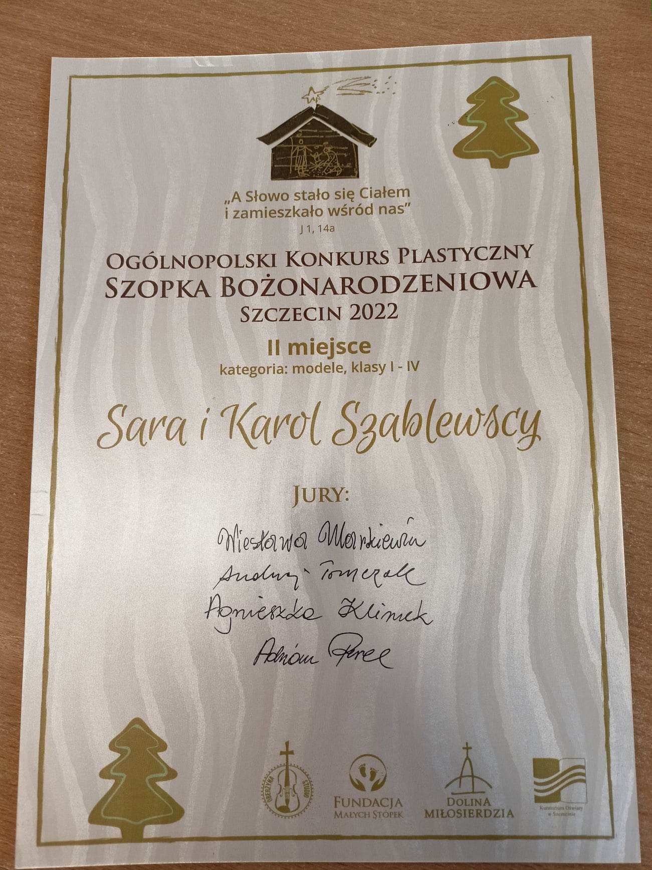Dyplom dla Sary i Karola Szablewskich za zajęcie drugiego miejsca w konkursie "Szopka Bożonarodzeniowa"